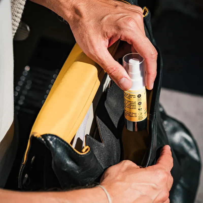The small white Shroomwell spray bottle in a bag, from the seller's photograph