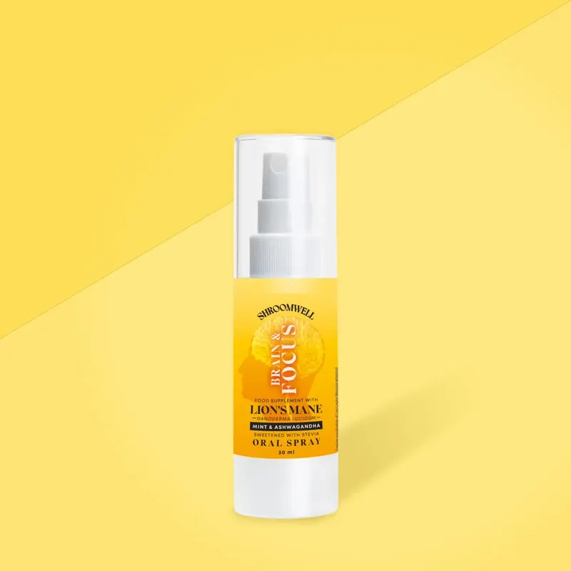 The white 30-milliliter airless spray bottle of Shroomwell Brain & Focus Spray on a yellow background, from the seller's photograph